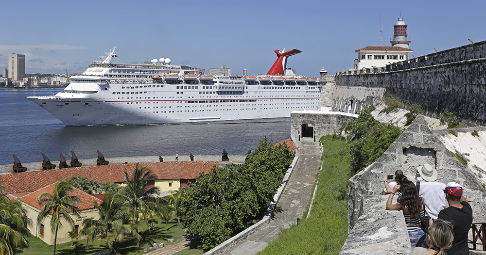 The Carnival Paradise passes the historic El Morro Castle in Havana, Cuba. (Sven Creutzmann/Carnival Cruise Line)